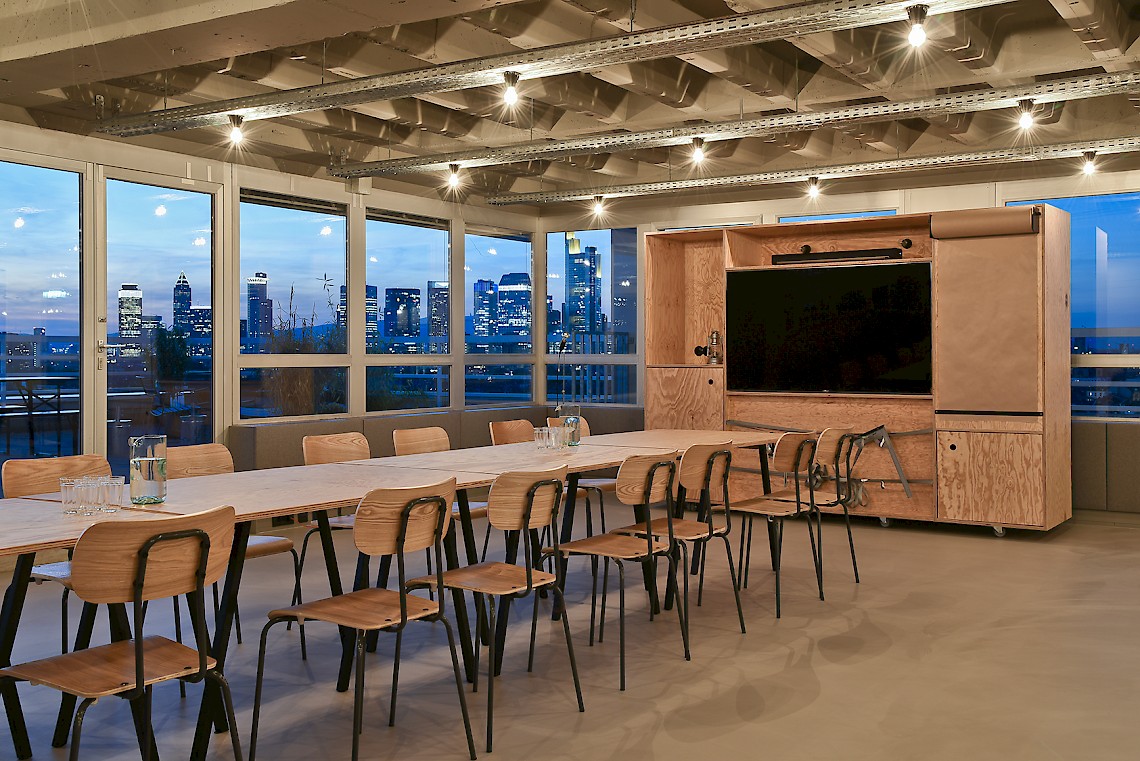 Meeting area with sunset skyline view